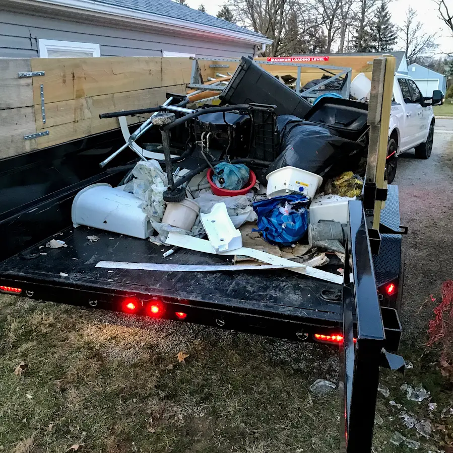 Roll-off dumpster delivered to a residential driveway in St. Charles